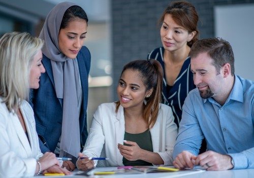 Diverse group of people working together